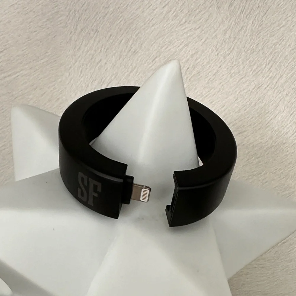 Black Electronics Wearable Charging Bracelet with SF initial.